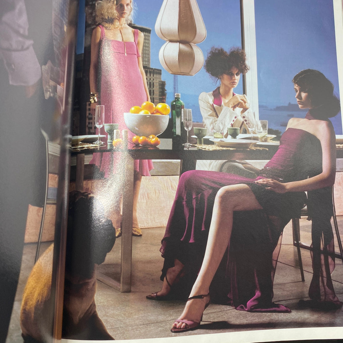 Fashion editorial spread from City NY Magazine September - October 2000 showcasing models in elegant attire at a dining table.