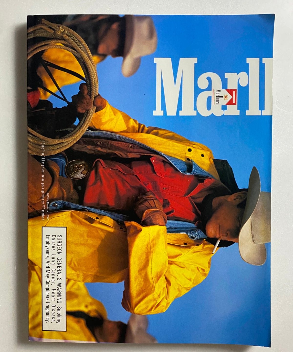 Cover of the Marl Magazine featuring a cowboy in vibrant clothing and hat, highlighting the theme of outdoor lifestyle.