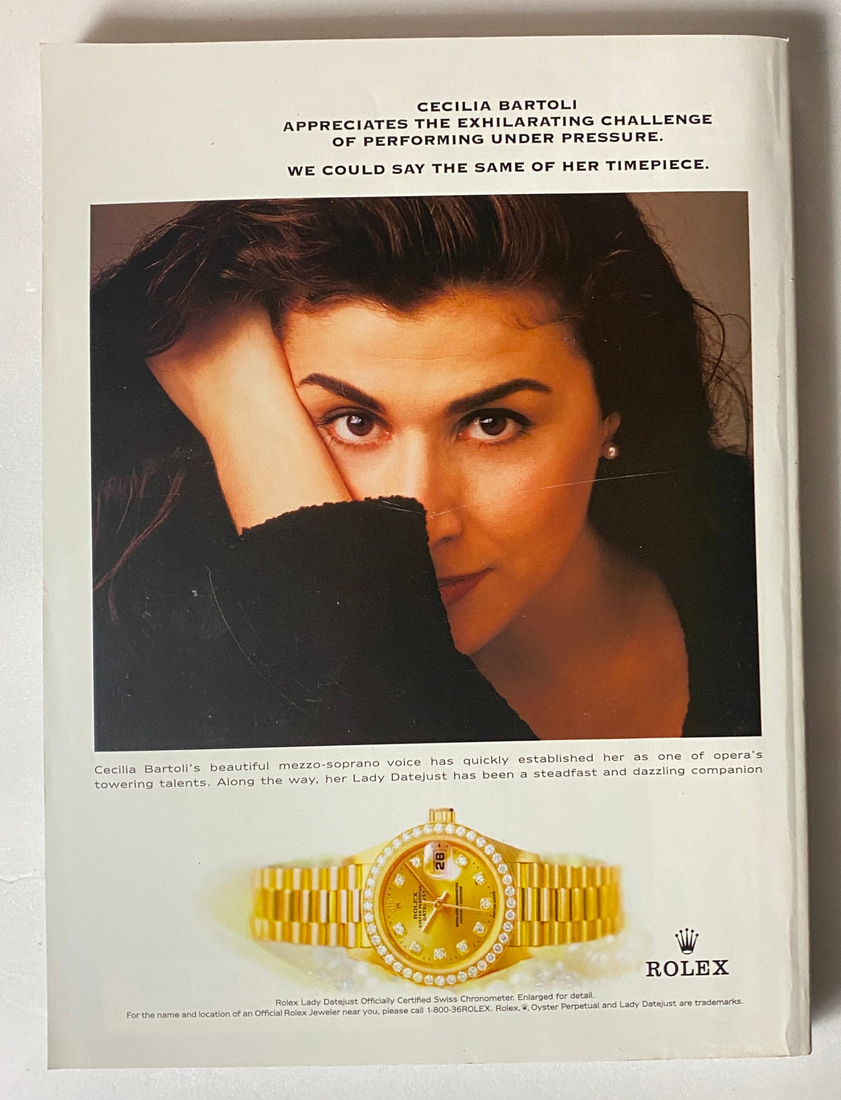 Advertisement in Vanity Fair Magazine October 1999 featuring mezzo-soprano Cecilia Bartoli with a Rolex watch, emphasizing her talent and connection to performing under pressure.