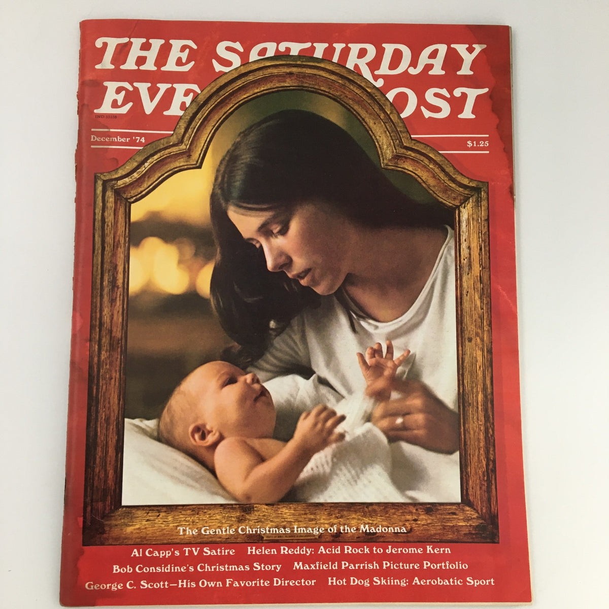 The Saturday Evening Post December 1974 cover featuring a touching Mother & Child image, showcasing the festive spirit of family during the holiday season.