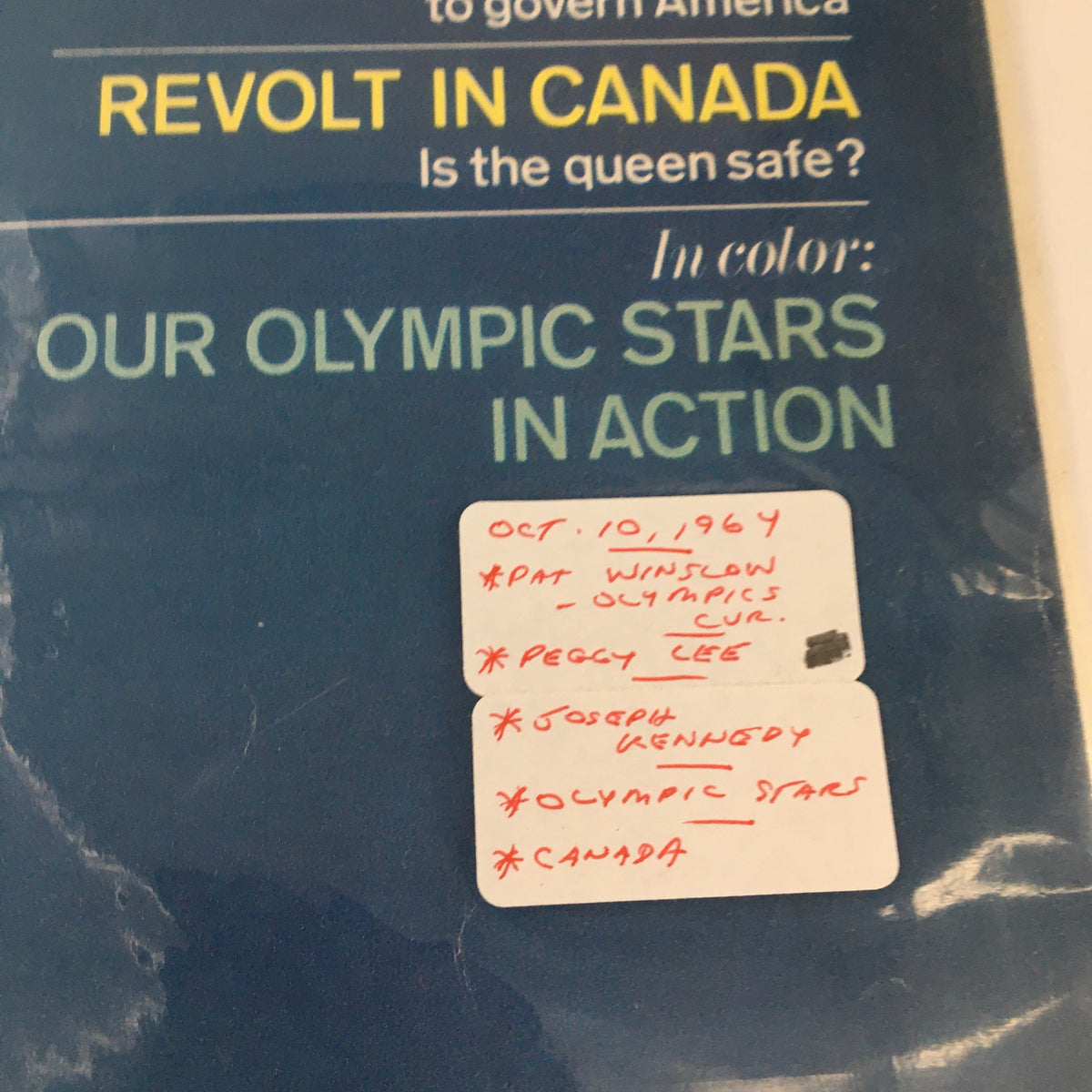 Close-up of The Saturday Evening Post October 10 1964, featuring a label noting key topics including Pat Winslow Olympic cover, Joseph Kennedy, and Peggy Lee.