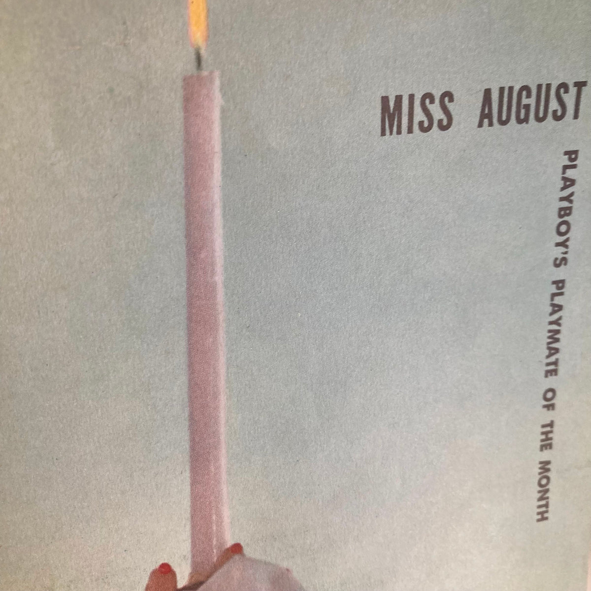 Page from VTG Playboy Magazine August 1957 showcasing a soft-focus artistic image with a candle, celebrating the Playmate of the Month.