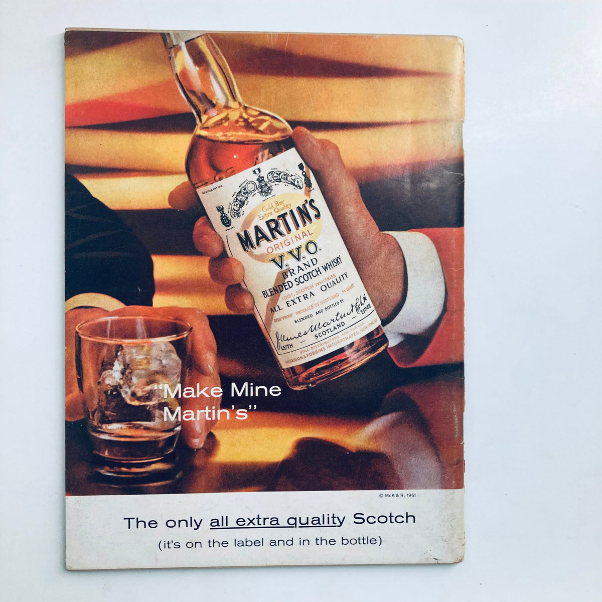 Vintage advertisement in Playboy Magazine July 1962 for Martin's original blended Scotch whisky, emphasizing a sophisticated lifestyle from the early 1960s.