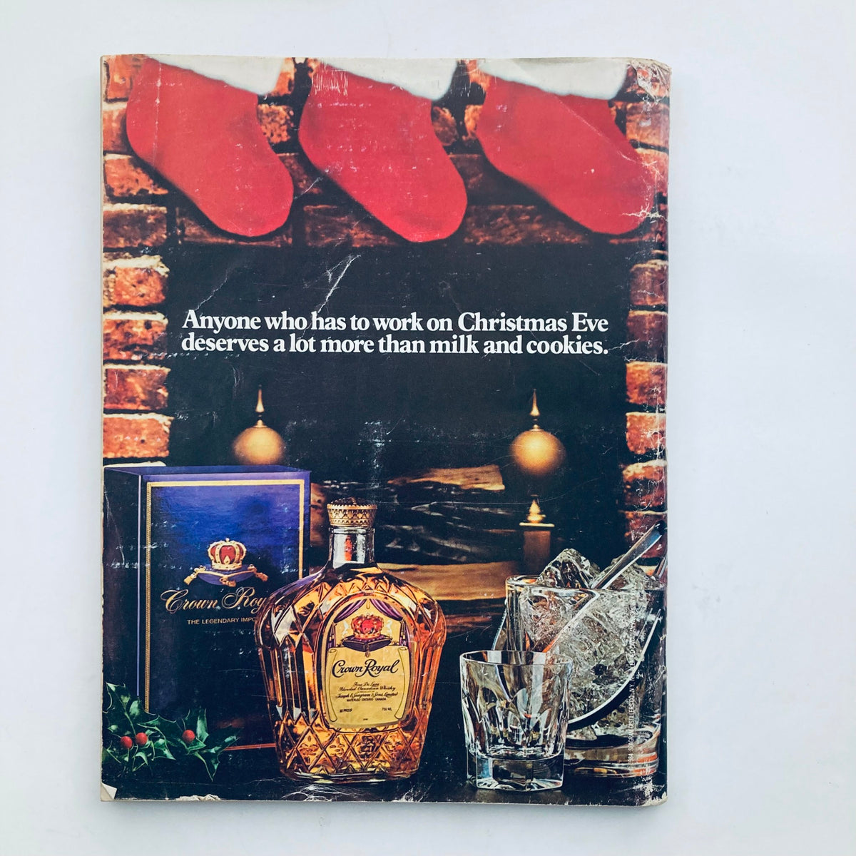 Back cover of VTG Playboy Magazine December 1984 with a holiday-themed advertisement for Crown Royal whiskey, perfect for collectors.