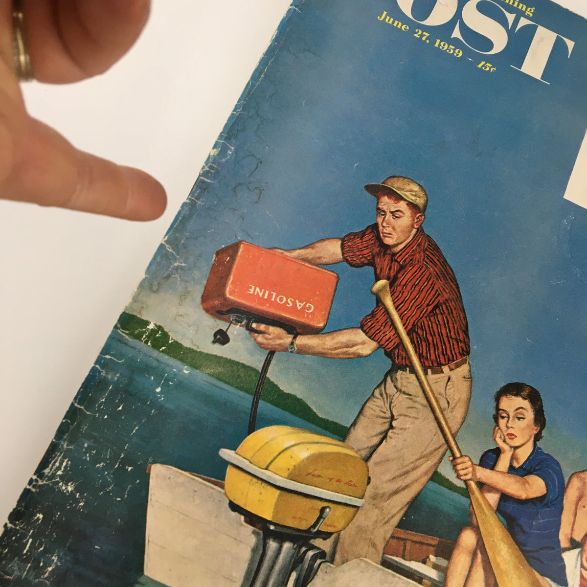 Close-up of the cover of The Saturday Evening Post June 27, 1959, showcasing the illustration of a man with a gasoline can and a woman, emphasizing the nostalgic design.