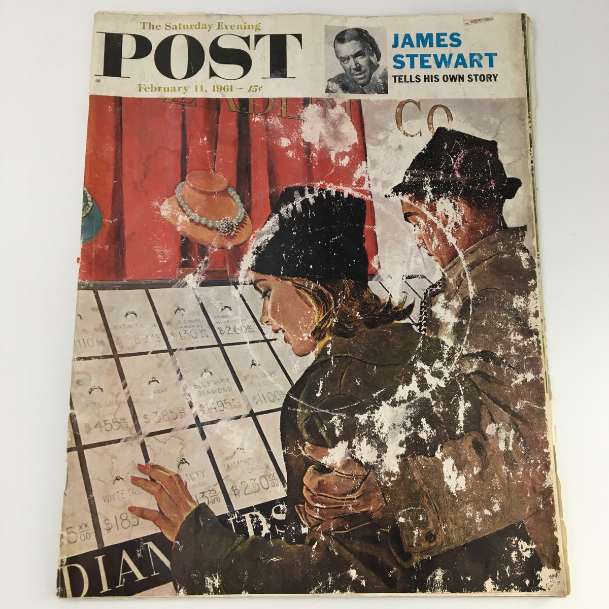 Cover of The Saturday Evening Post dated February 11, 1961, featuring a captivating story about James Stewart, depicting a couple examining diamond prices at a jewelry store.