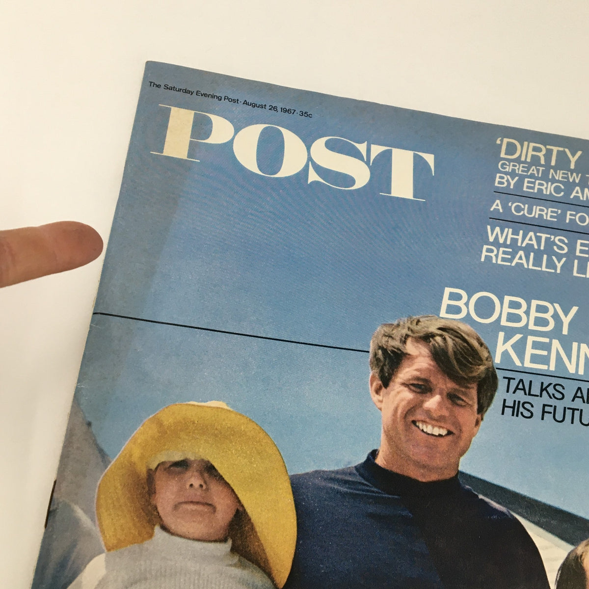 Close-up of The Saturday Evening Post August 26 1967 cover showing Bobby Kennedy with children, highlighting the iconic imagery of the Kennedy family.