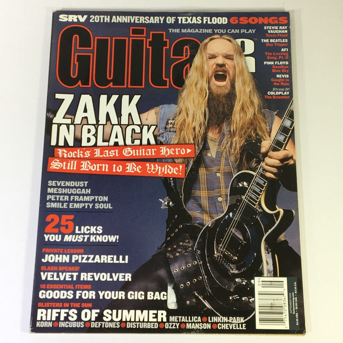 Guitar One Magazine September 2003 featuring Zakk Wylde on the cover, highlighting his influence as a rock star and 'Last Guitar Hero'. The issue includes articles about renowned guitarists, making it a collectible item for music enthusiasts.