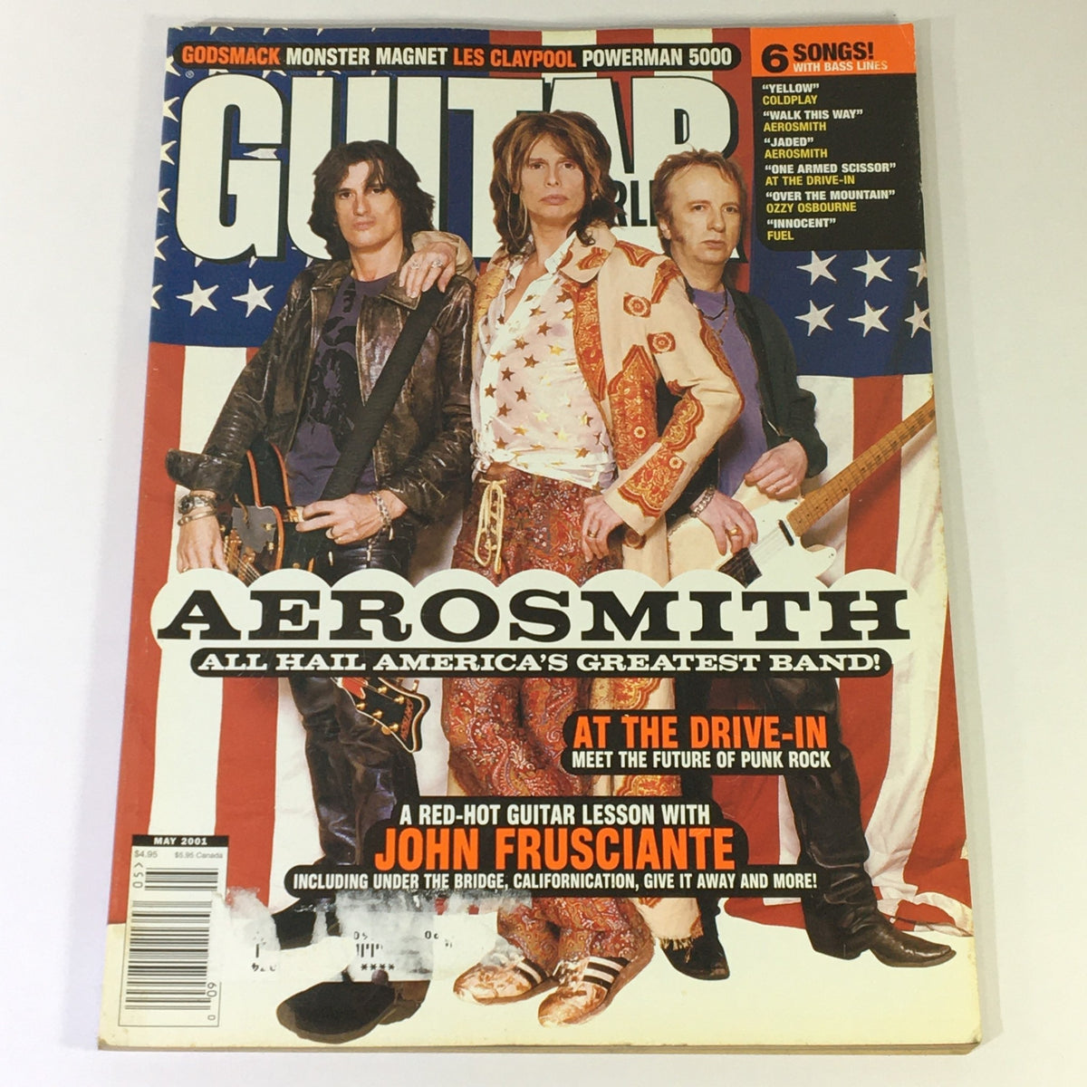 Guitar World Magazine May 2001 featuring Aerosmith with Steven Tyler and band on the cover, showcasing punk rock culture.