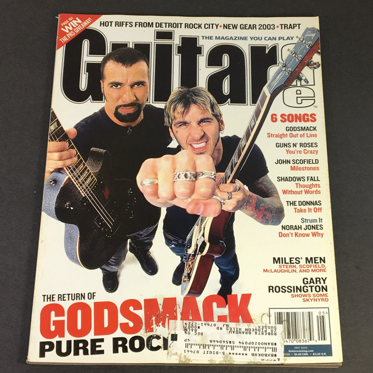 Guitar One Magazine May 2003 featuring Godsmack and Guns N' Roses on the cover, showcasing iconic rock musicians in a vintage collectible publication.