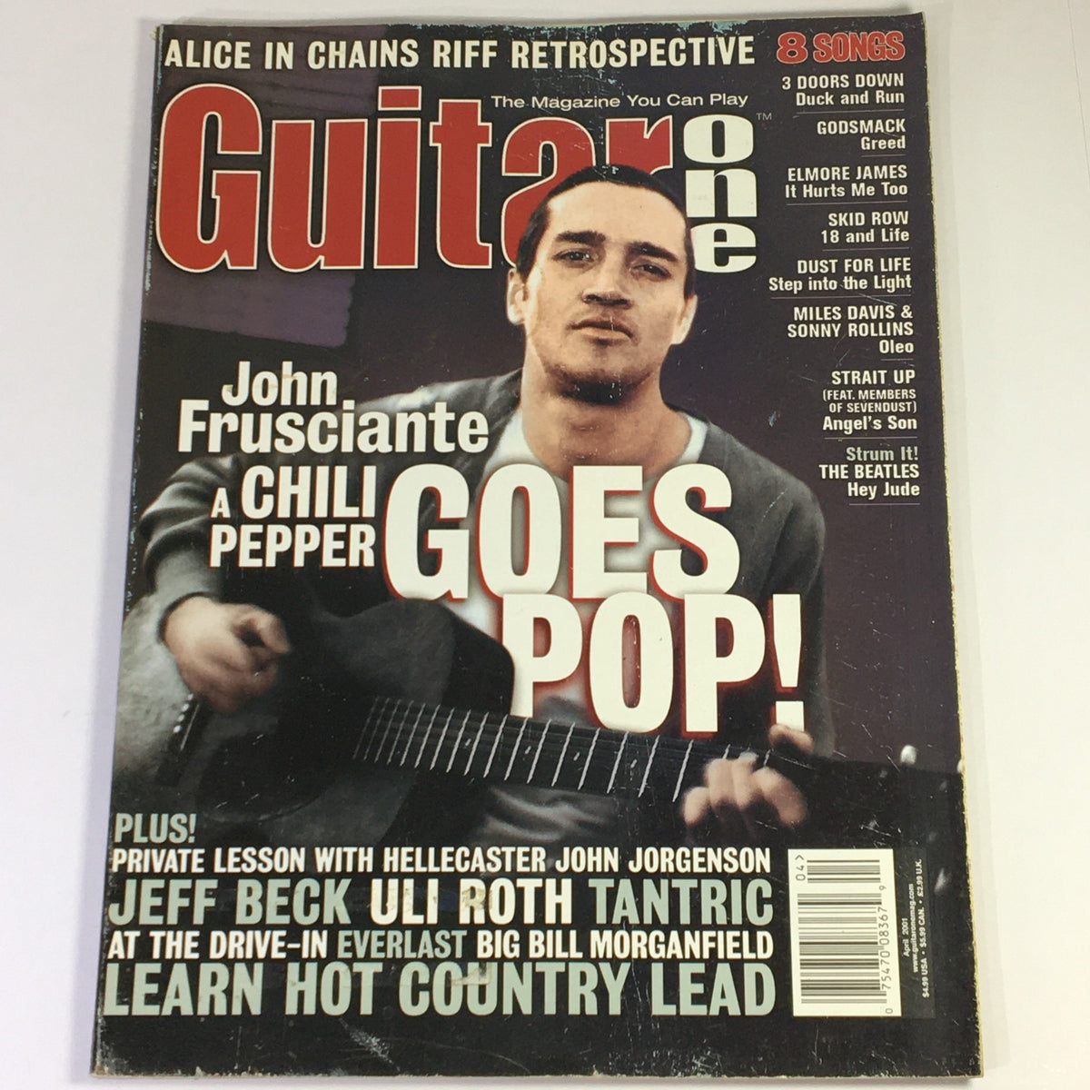 Cover of Guitar One Magazine April 2001 featuring John Frusciante, showcasing an interview and insights into his music career, with additional features on Jeff Beck, Uli Roth, and Tantric.
