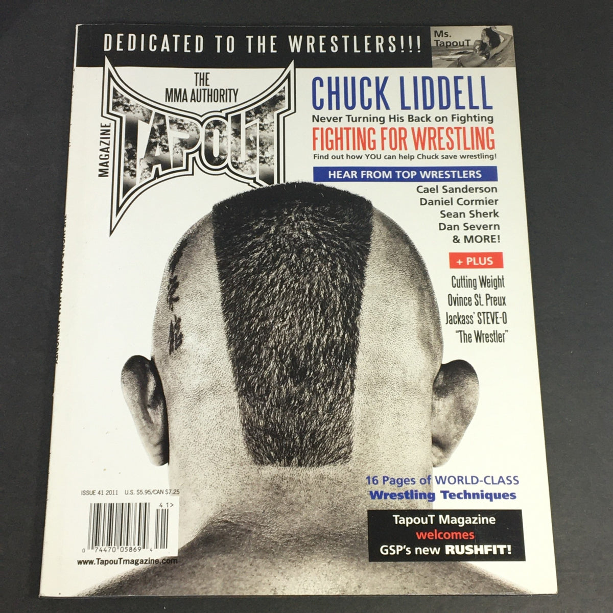 Cover of Tapout MMA Magazine #41 from 2011 featuring Chuck Liddell. Includes headlines about wrestling, and showcases mixed martial arts topics with key fighters like Daniel Cormier.