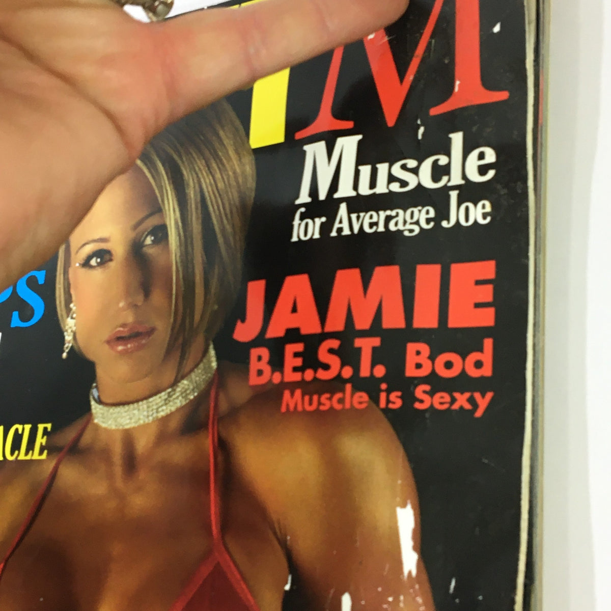 Another angle of the cover of Planet Muscle Magazine November December 2006 featuring Jamie Best, emphasizing the magazine's vintage appeal and the muscle culture theme.
