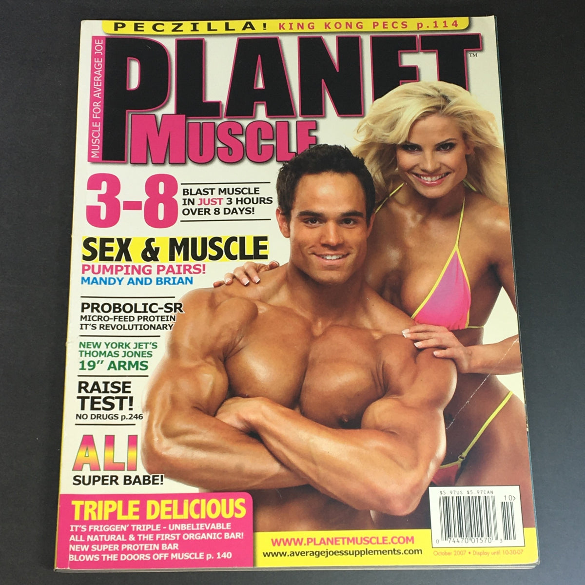 Cover of Planet Muscle Magazine October 2007 featuring Super Babe Ali and New York Jets star Thomas Jones. The cover highlights fitness, beauty, and sports with bold headlines and vibrant imagery.