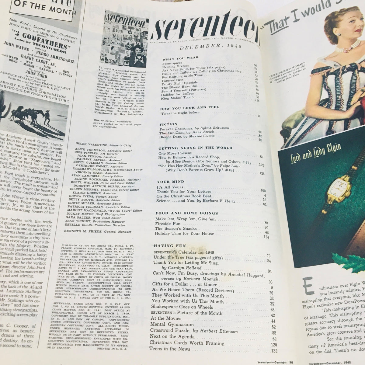 Inside spread of Seventeen Magazine December 1948, displaying the table of contents alongside editorial notes, offering a glimpse into the magazine's vintage layout and content.