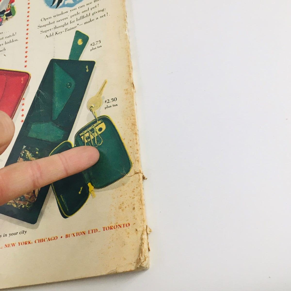 Promotional page from Seventeen Magazine December 1948 showcasing various purse styles by Buxton, highlighting features and prices in a retro layout.