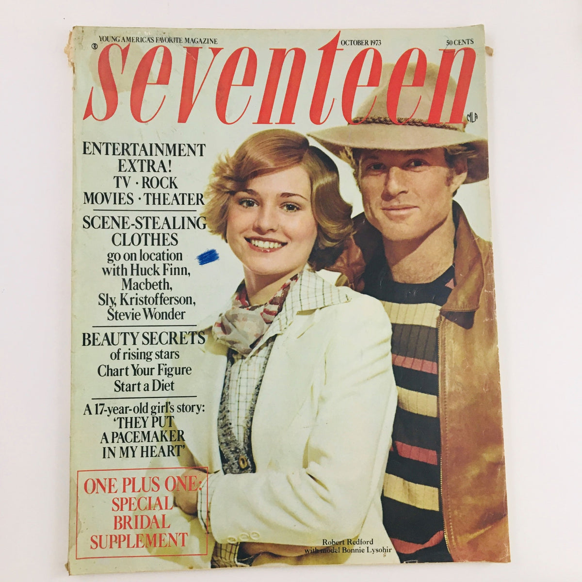 Cover of Seventeen Magazine from October 1973 featuring Robert Redford and Bonnie Lysohir, highlighting youth culture and fashion of the early 1970s.