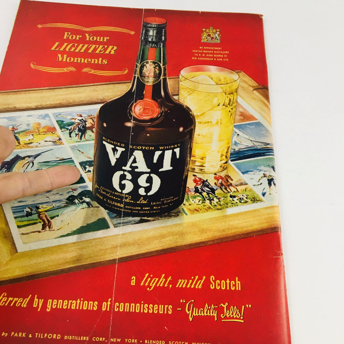 Cover of The New Yorker Magazine May 24 1952 featuring a theme design by Leonard Dove, showcasing a vintage advertisement for VAT 69 Blended Scotch Whisky.
