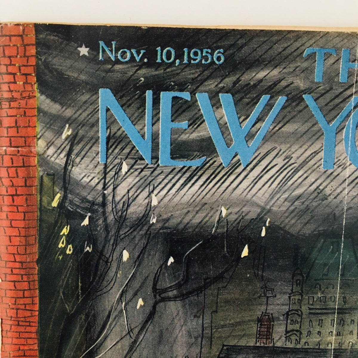 Detailed view of the corner of The New Yorker Magazine November 10 1956 cover, displaying the date and iconic title artistically illustrated by Ludwig Bemelmans.