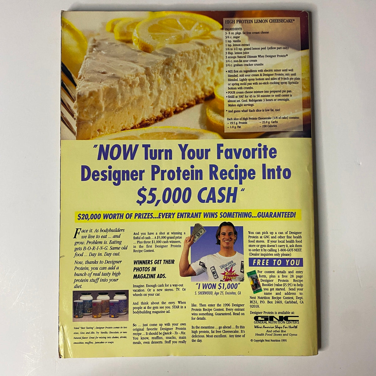 Back cover of Muscular Development Magazine January 1996 featuring a promotional advertisement for a protein recipe contest with a photo of a smiling participant, emphasizing fitness and health.