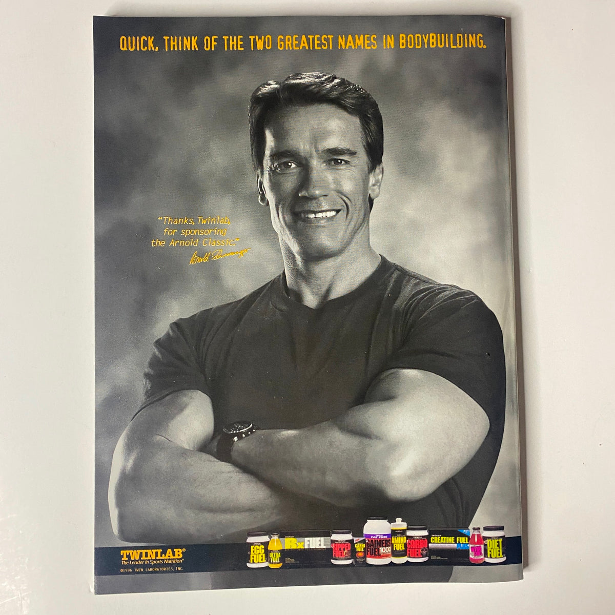Muscular Development Magazine September 1996 with a promotional advertisement featuring a smiling Arnold Schwarzenegger, highlighting his iconic status in bodybuilding and fitness.