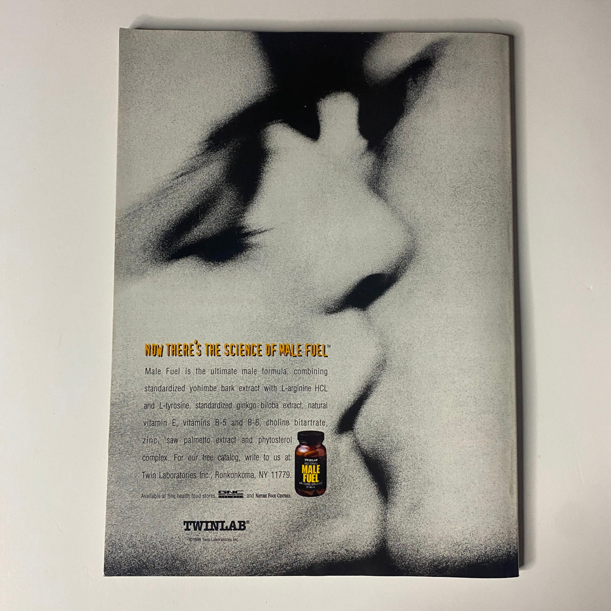 Back cover of Muscular Development Magazine October 1996 featuring an advertisement for Male Fuel, promoting bodybuilding supplements. The design is stark with a close-up photographic effect and clear promotional text.