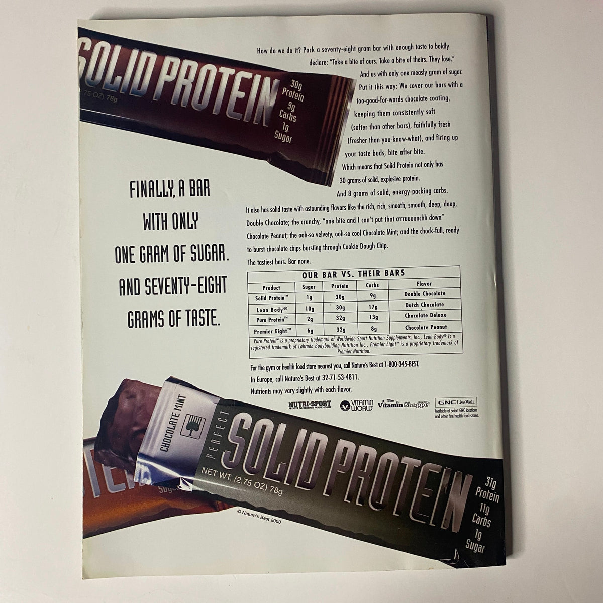 Back cover of Muscular Development Magazine September 2000 advertising Solid Protein bars, emphasizing low sugar and high taste.