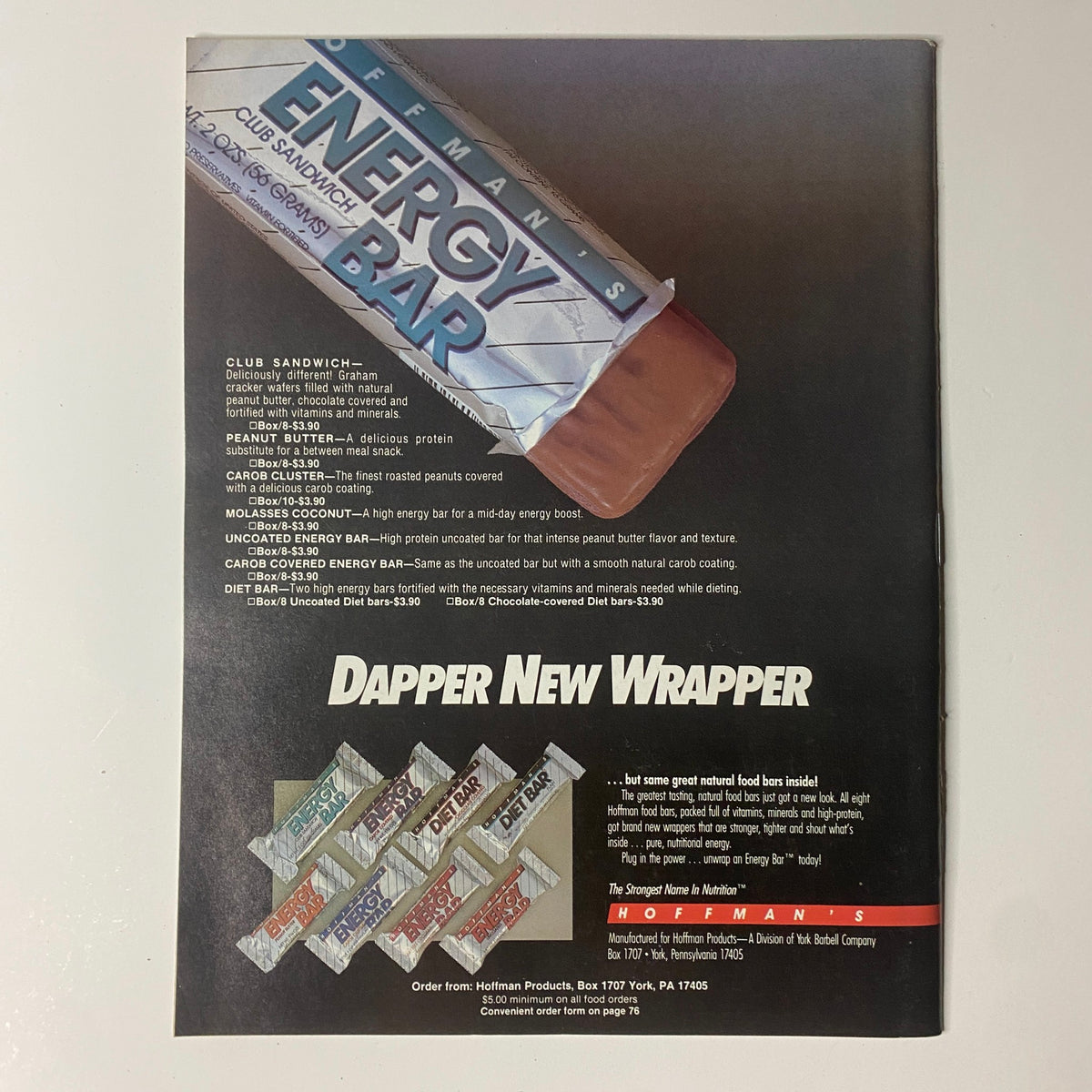 Back cover of Muscular Development Magazine May 1987 advertising a new Dapper Energy Bar, showcasing various flavors and health benefits, with an emphasis on fitness and bodybuilding.