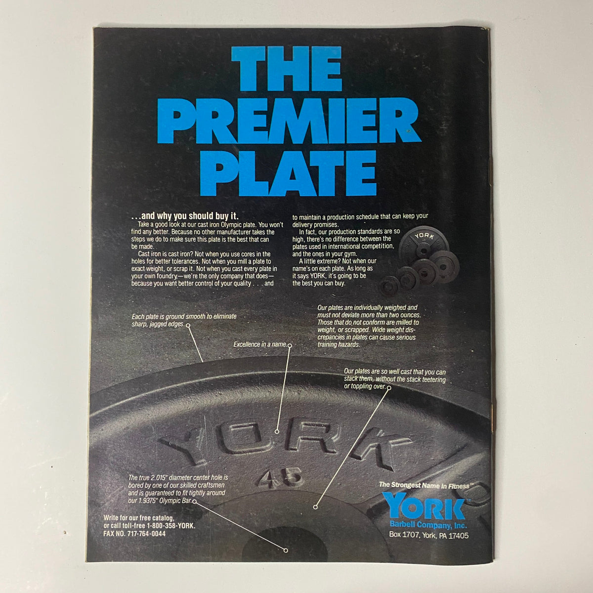 Advertisement page from Muscular Development Magazine February 1988 for York weight plates, detailing product features and benefits related to strength training.