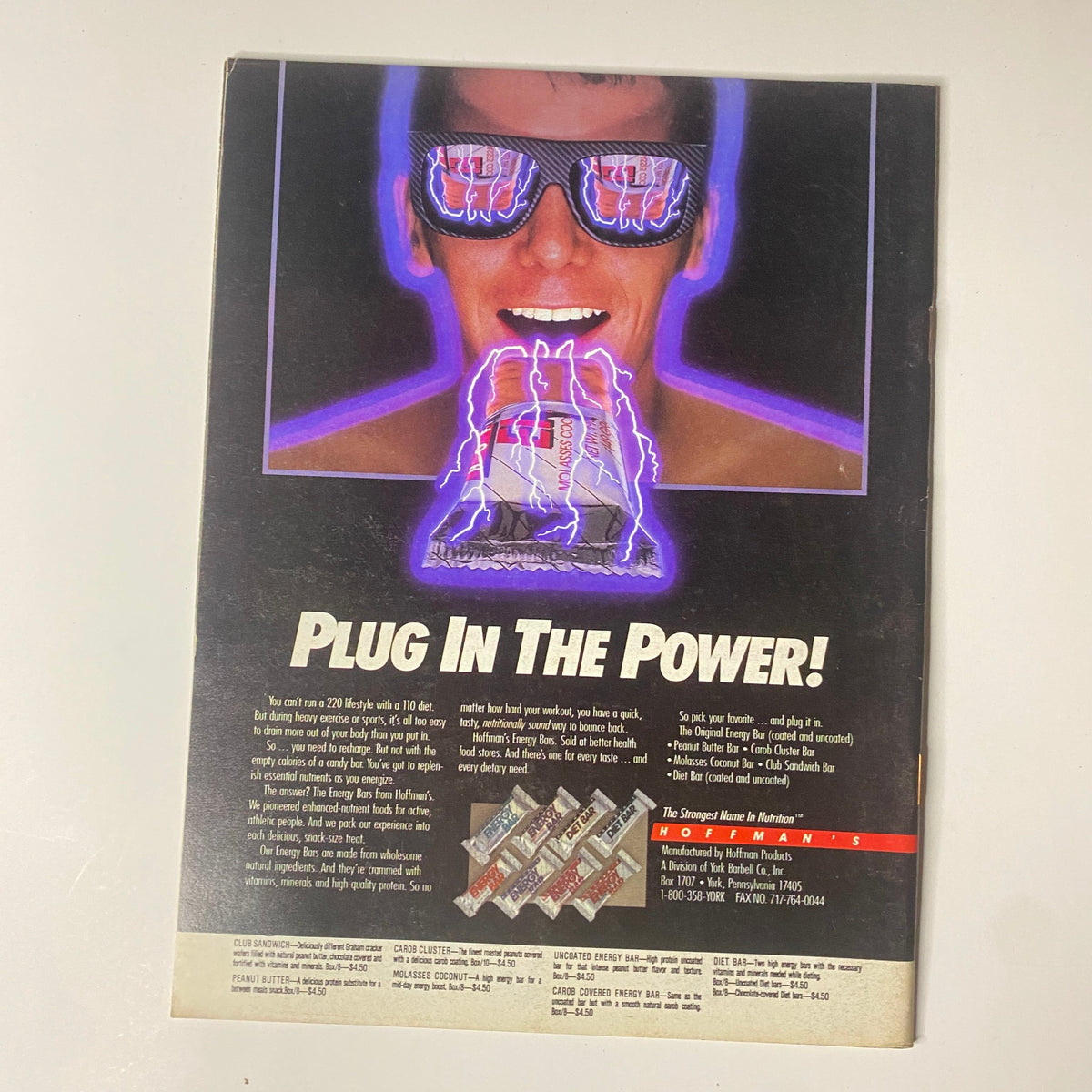 Back cover of Muscular Development Magazine September 1988 advertising energy and fitness products, featuring a vivid graphic of a model wearing neon sunglasses.