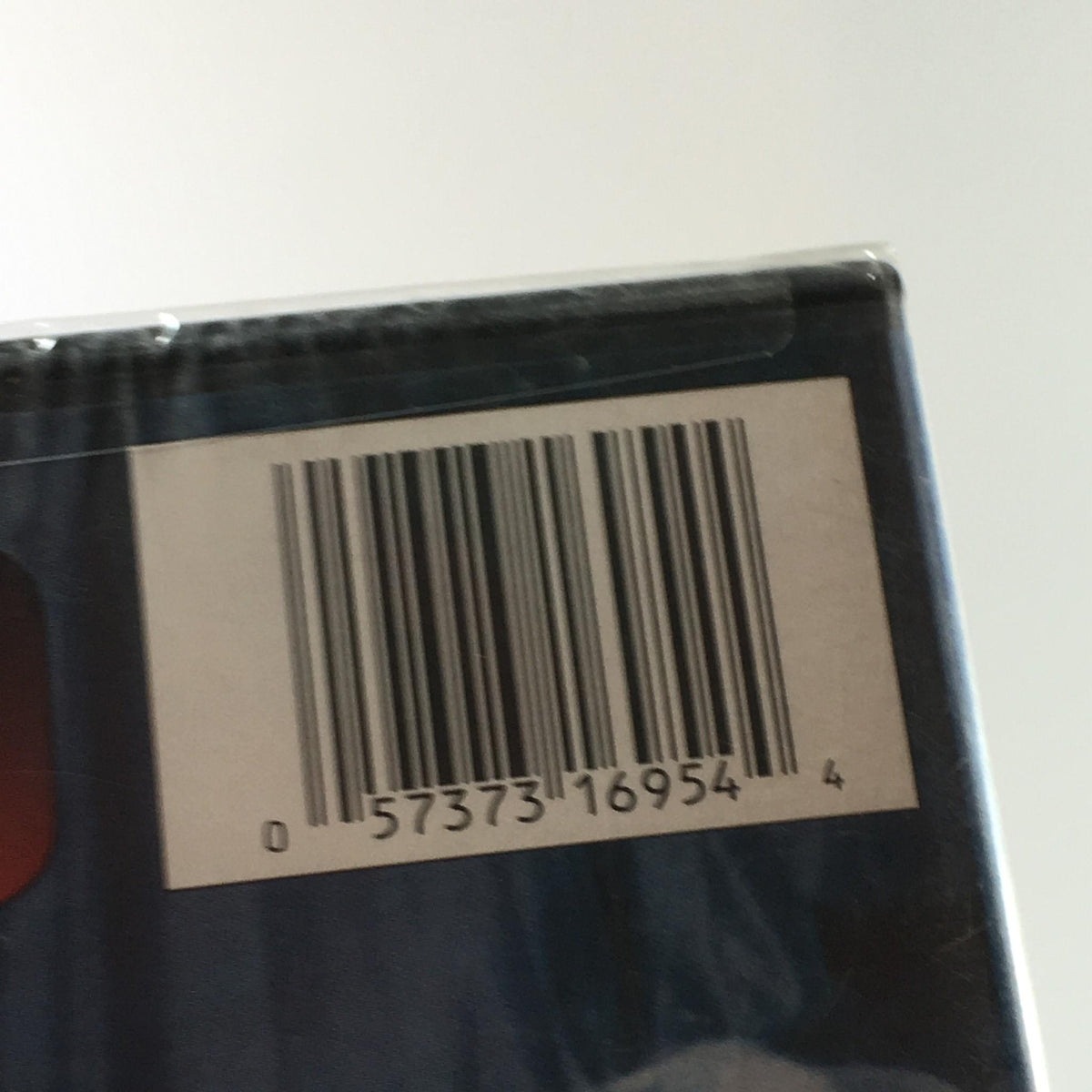 Close-up of the barcode on the DVD 'Rider on the Train Charles Bronson', important for inventory tracking.