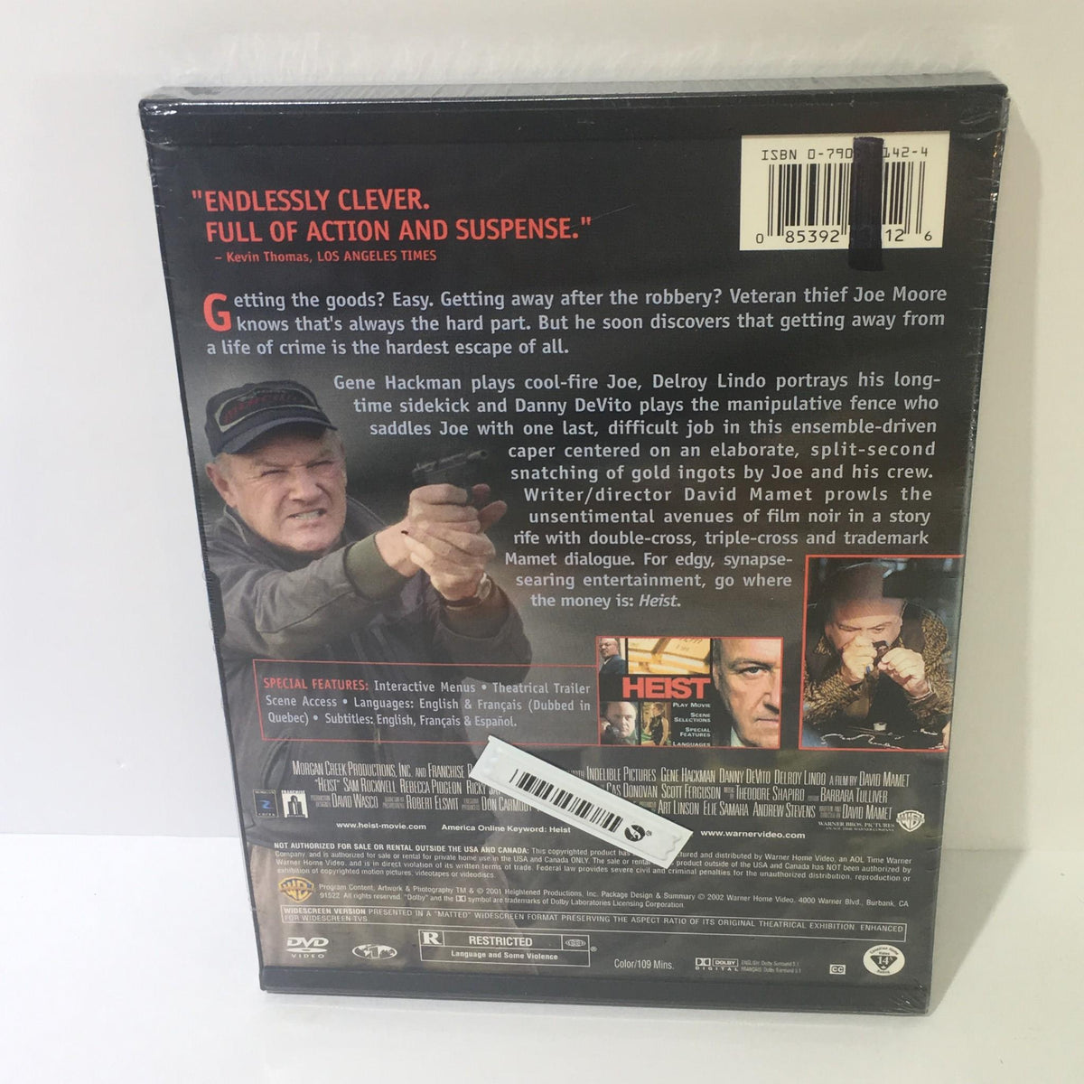 Back cover of the Heist DVD featuring Gene Hackman, Danny DeVito, and Delroy Lindo, showcasing a summary of the film's plot and special features.