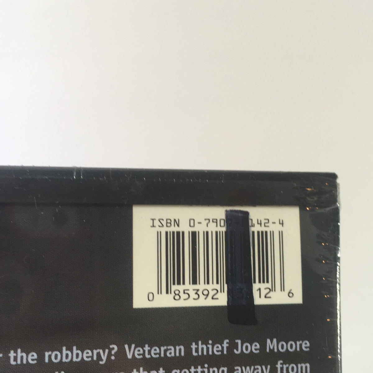 Close-up of the ISBN barcode from the Heist DVD, highlighting details relevant for inventory or purchase.