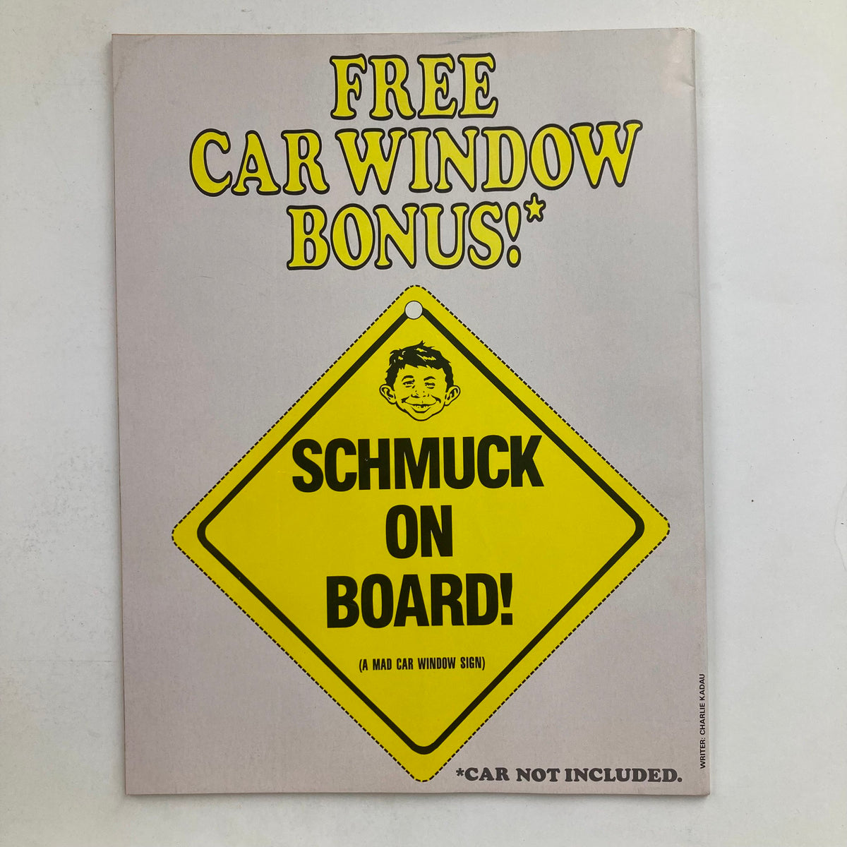 Back cover of Mad Magazine December 1986 No. 267 displaying an advertisement for a free car window bonus sign titled 'Schmuck on Board!'