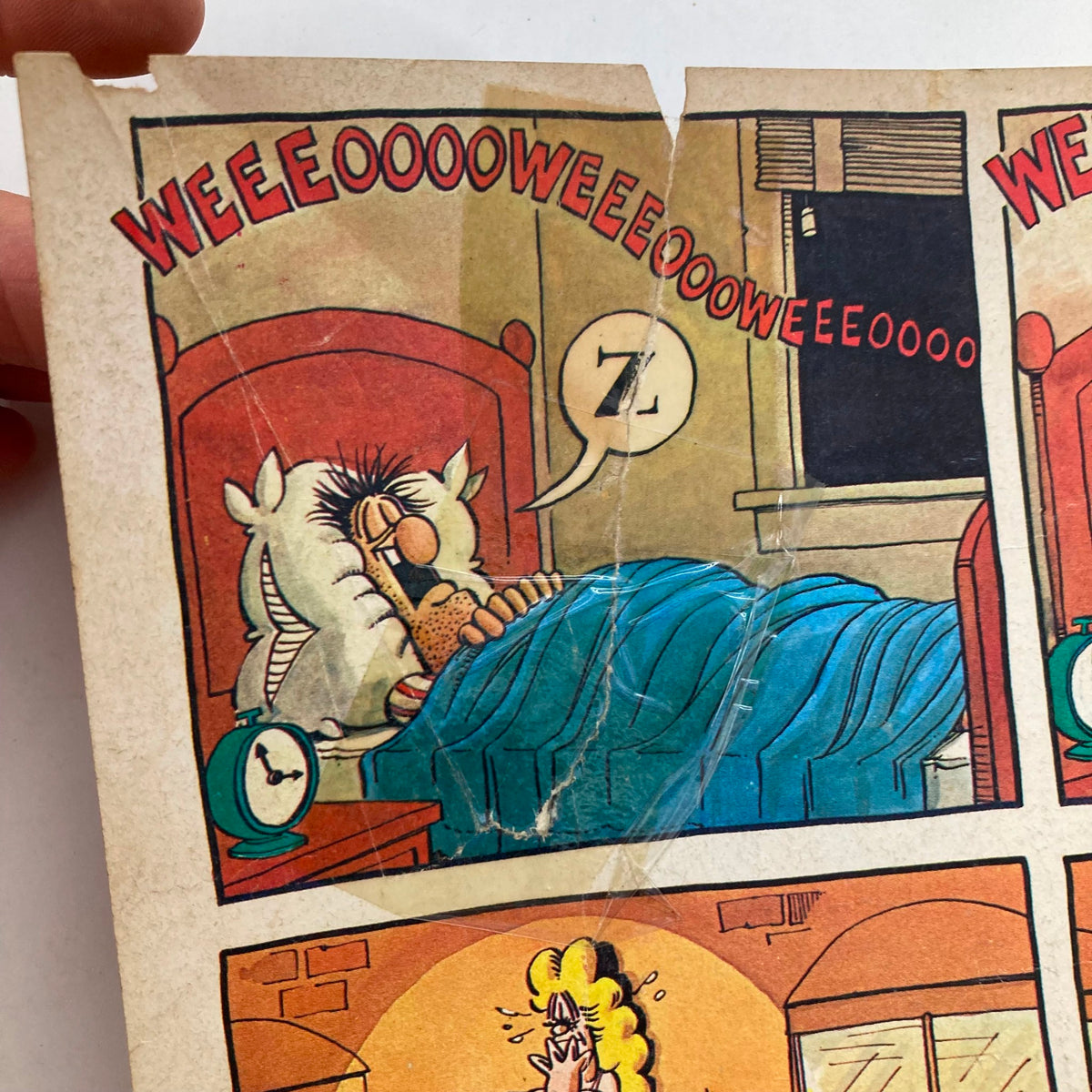 Detail of a comic strip from Mad Magazine June 1980 No. 215, depicting a funny scene involving characters in a bedroom, capturing the humor of the magazine.