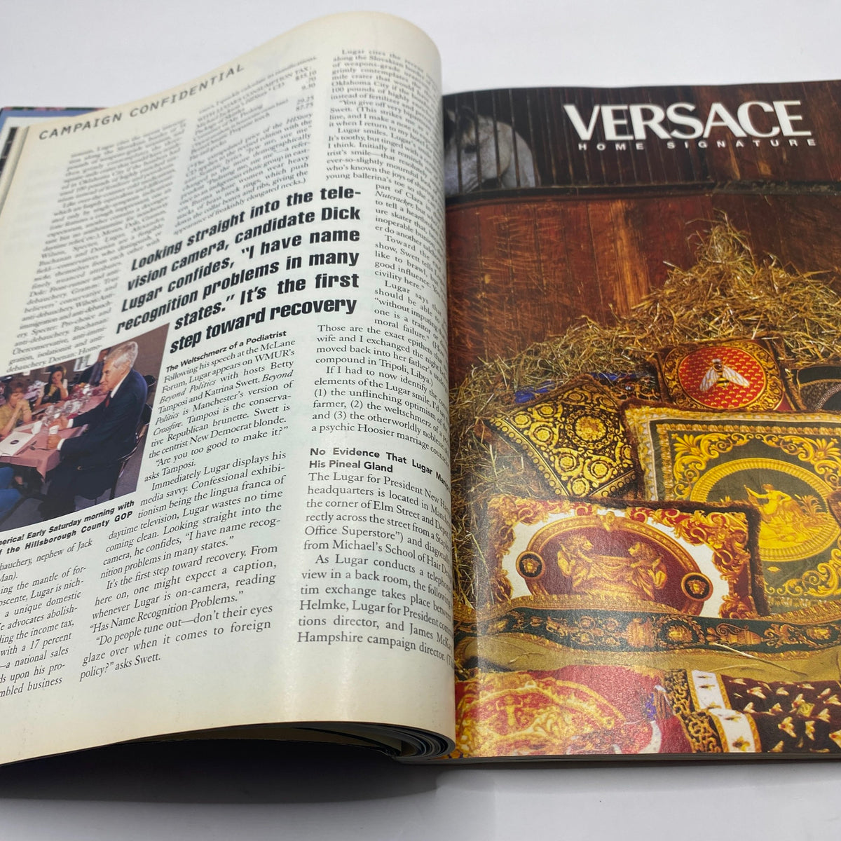 Advertisement pages from George Magazine October - November 1995 featuring Nautica and Versace, representing the intersection of fashion and cultural commentary.