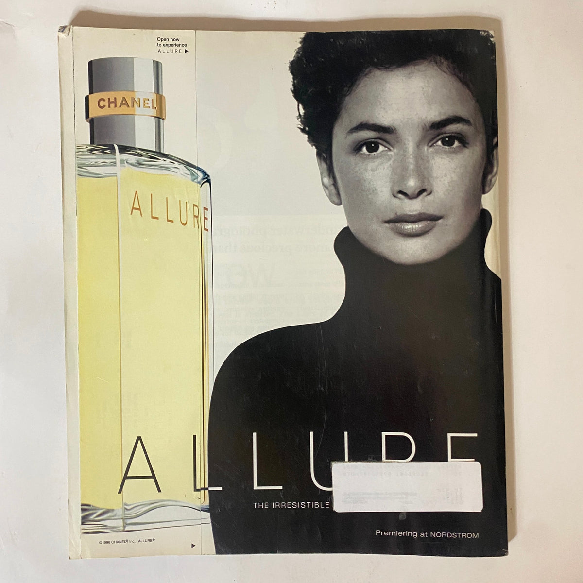 Cover image of Allure Magazine featuring a model with Chanel fragrance, illustrating vintage beauty and fashion.