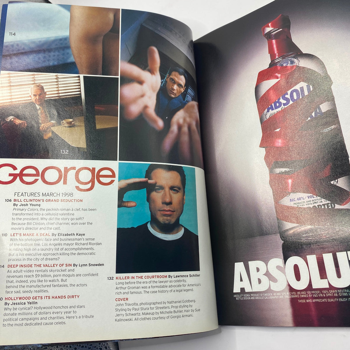 Interior spread of George Magazine March 1998, featuring an article about John Travolta and images related to celebrity culture. A glimpse into pop culture history.