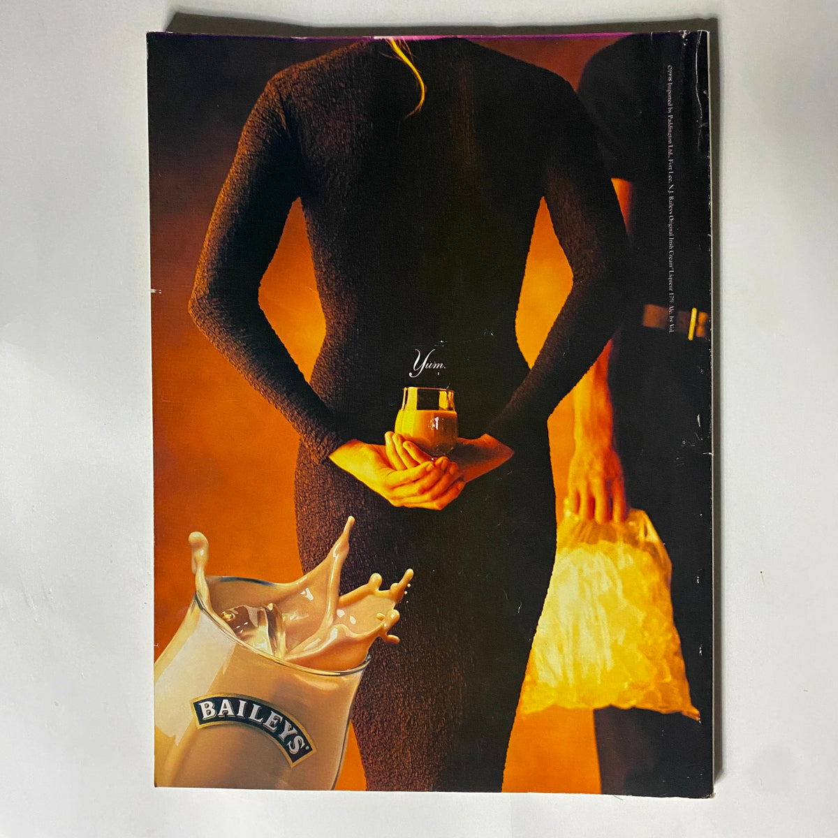 Back cover of George Magazine April 1998 highlighting an advertisement for Baileys, adding to the vintage charm of the magazine.
