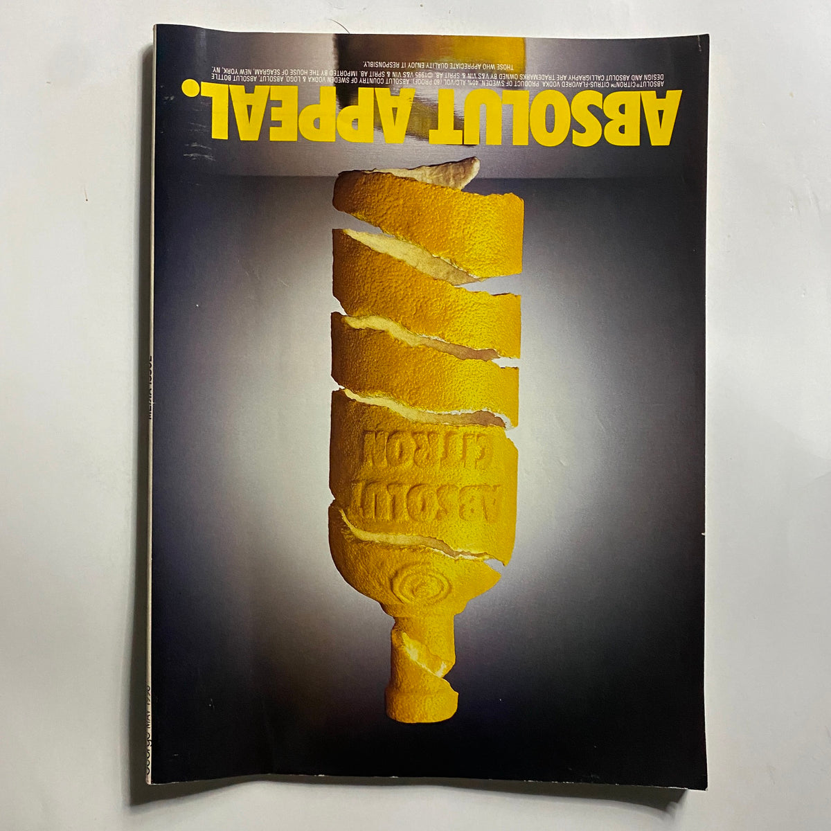 Cover of George Magazine May 1998, showcasing a creative design with the iconic cover story featuring Christy Turlington, surrounded by symbolic imagery reflecting vintage magazine aesthetics.