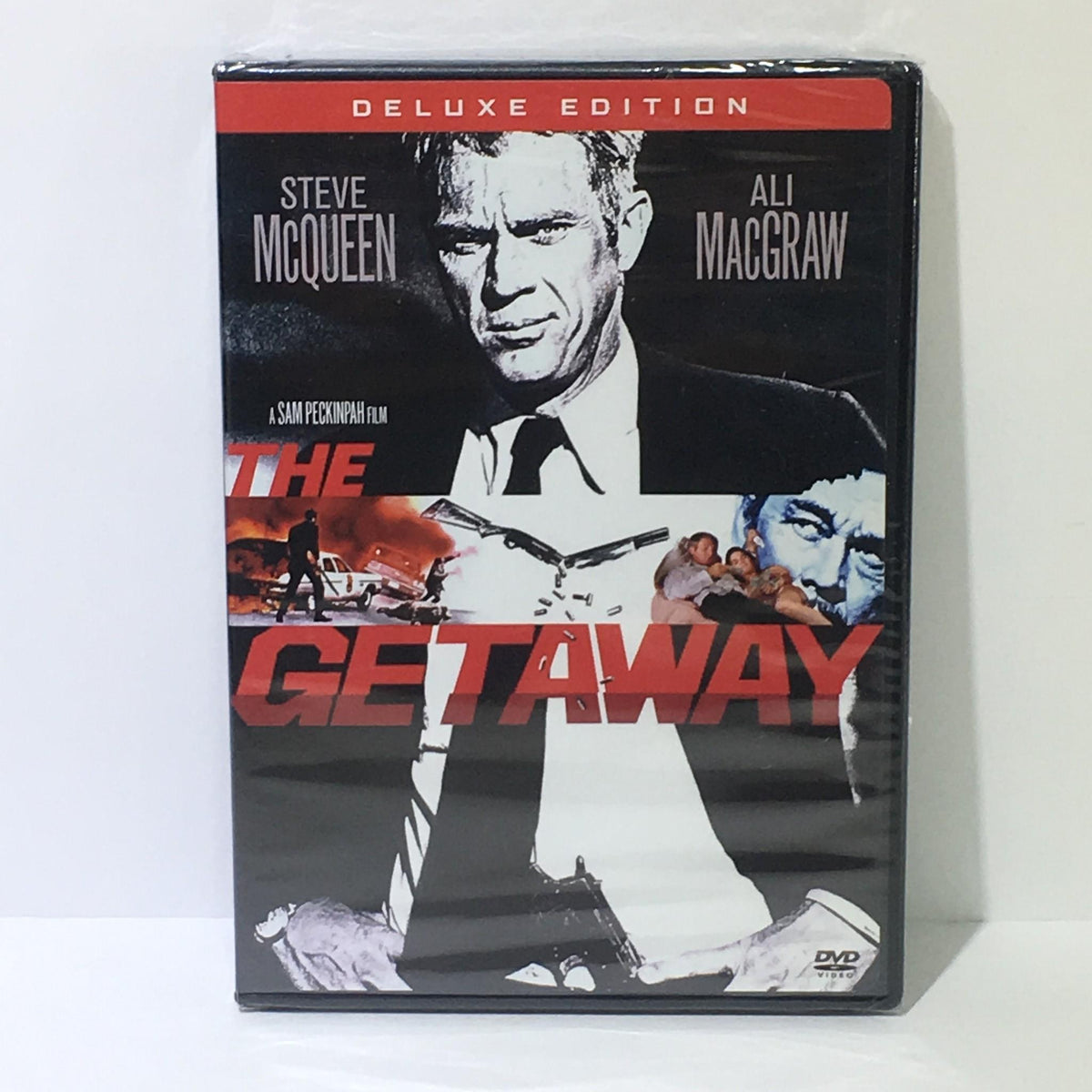 The Getaway Steve McQueen Ali MacGraw DVD cover, showcasing the Deluxe Edition with striking graphics and iconic imagery from the film.