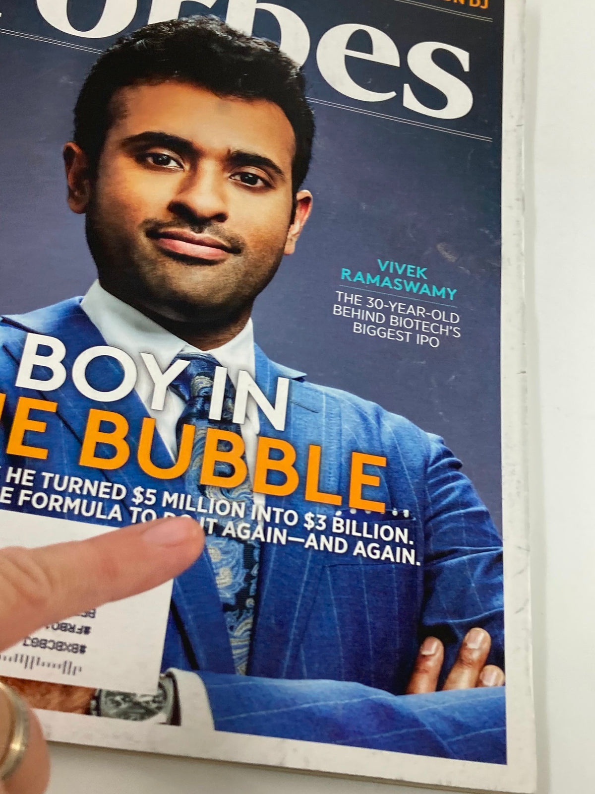 Close-up of Forbes Magazine cover from September 28 2015, showcasing Vivek Ramaswamy and the headline 'Boy In The Bubble,' emphasizing his journey from $5 million to $3 billion.