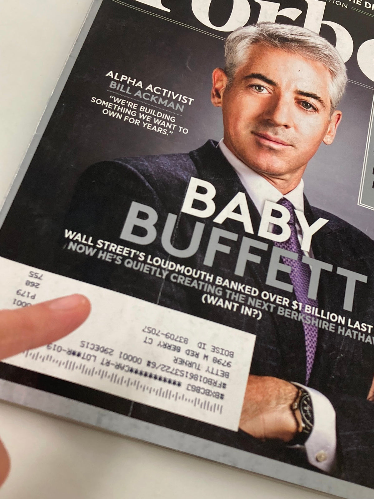 Close-up of the Forbes Magazine cover from May 25, 2015, showing Bill Ackman with a focus on the text about Baby Buffett and investment insights.