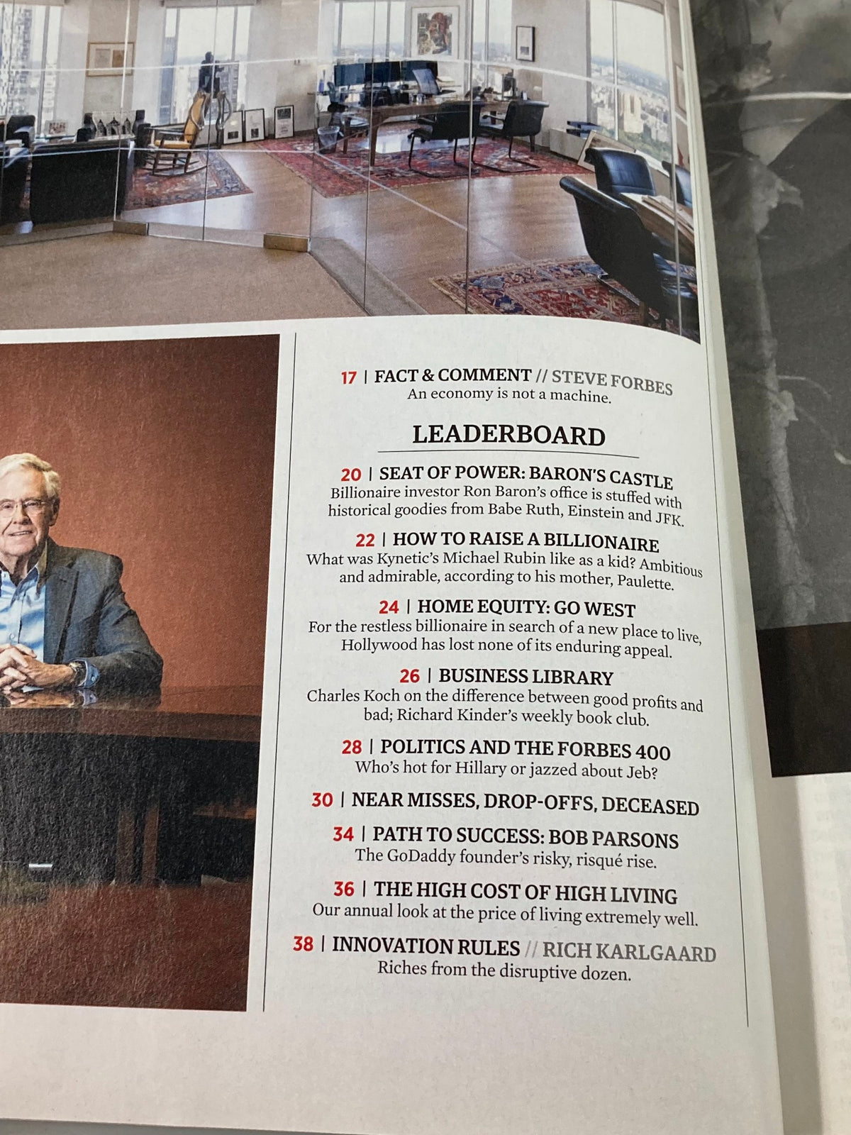 Detailed view of a page from Forbes Magazine October 19 2015, including the Leaderboard section discussing wealth trends.