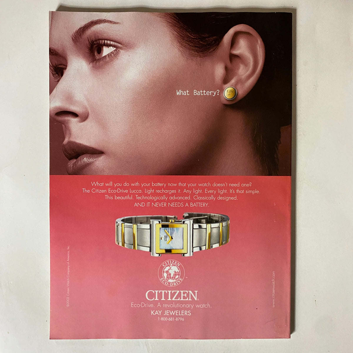 Advertisement from Tennis Magazine September 2002 for Citizen Eco-Drive watch, featuring a model showcasing the timepiece.