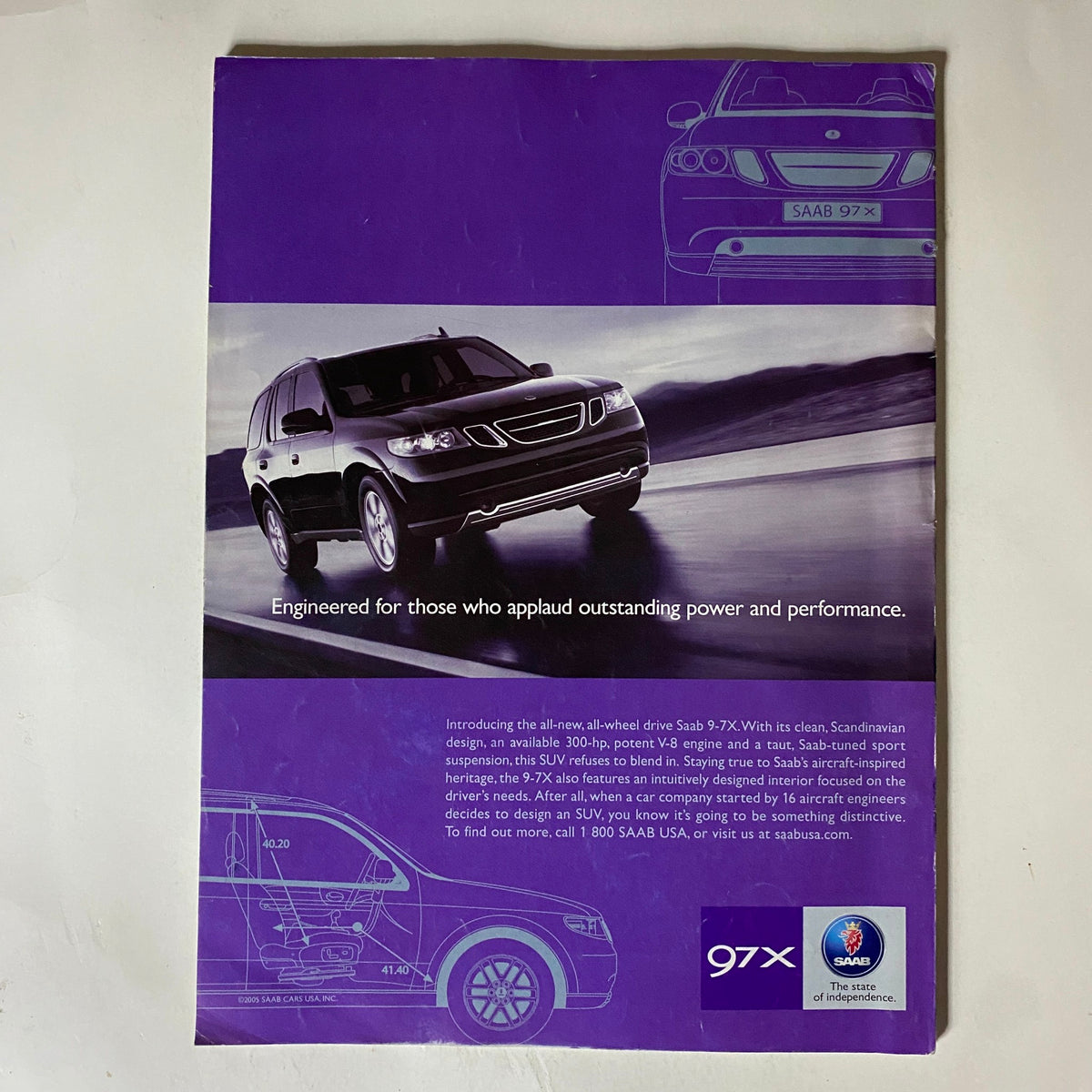 Back cover of Tennis Magazine September 2005 advertising the Saab 97X, highlighting its power and performance features.