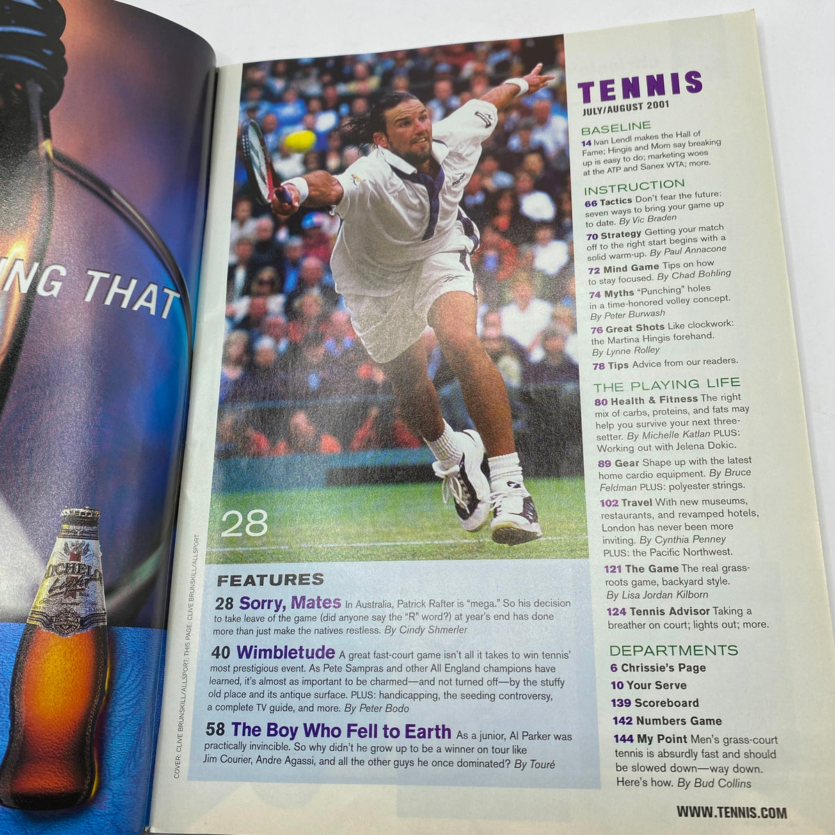 Inside view of Tennis Magazine July August 2001 featuring Patrick Rafter cover, highlighting tennis articles and player rankings.