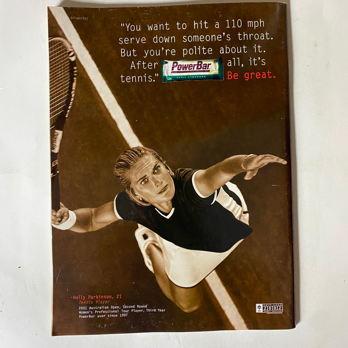 Back cover of Tennis Magazine July August 2001 with a PowerBar advertisement and quote about tennis, featuring female tennis player Holly Parkinson.