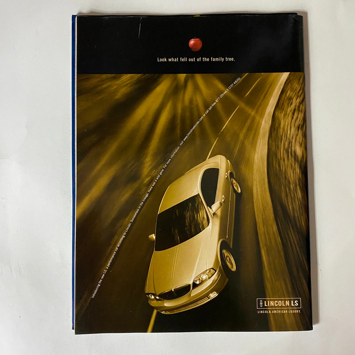 Back cover of Tennis Magazine February 2000, featuring a creative advertisement for Lincoln LS, complementing the theme of the magazine and its connection to sports and excellence.