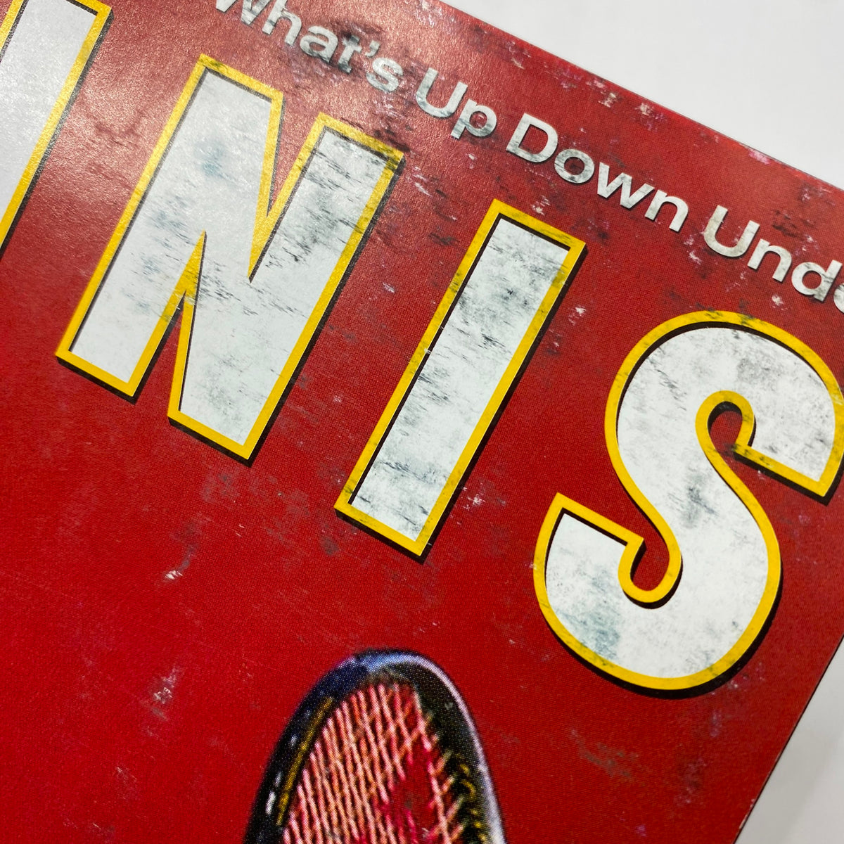 Close-up of the Tennis Magazine February 2002 cover, highlighting the vintage texture and title featuring Lleyton Hewitt, perfect for collectors.